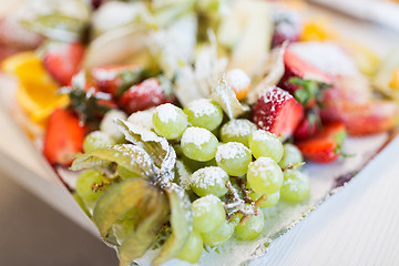 Image showing close up of dish with sugared fruit dessert