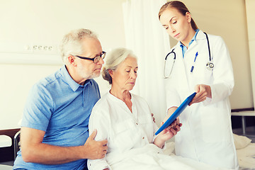 Image showing senior woman and doctor with tablet pc at hospital