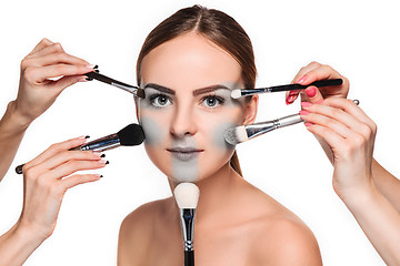 Image showing Beautiful female eyes with make-up and brush