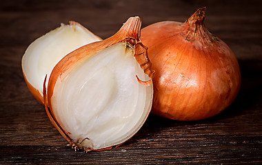 Image showing Onion on a wooden table