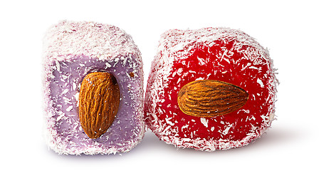 Image showing Two pieces of Turkish Delight with almonds beside