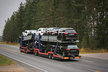 Image showing Car Transporter Truck Hauls New Cars on the Road