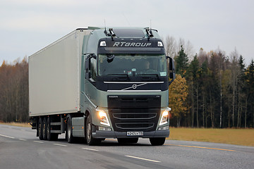 Image showing Green Volvo FH Transport Truck with Main Beams