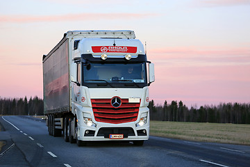 Image showing Mercedes-Benz Actros Trucking at Twilight Time