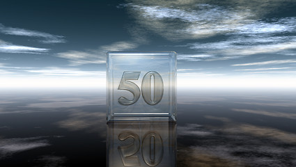 Image showing number fifty in glass cube under cloudy sky - 3d rendering