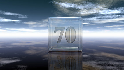Image showing number seventy in glass cube under cloudy sky - 3d rendering