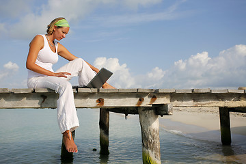 Image showing Woman on Jetty with Laptop