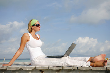 Image showing Woman on Jetty with Laptop