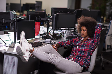 Image showing portrait of a young successful African-American woman in modern 