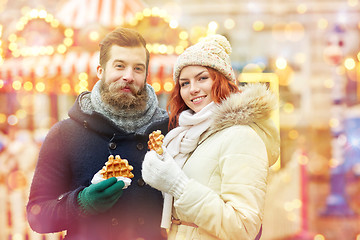 Image showing happy couple walking in old town