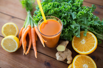 Image showing glass of carrot juice, fruits and vegetables