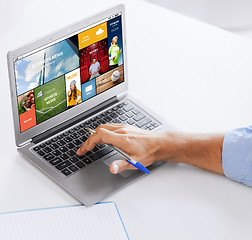 Image showing businessman with laptop computer working at office