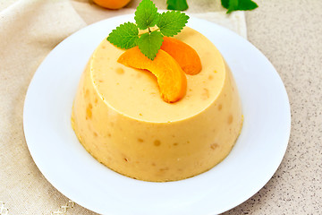 Image showing Panna cotta apricot on napkin and table