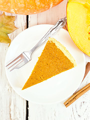 Image showing Pie pumpkin in plate on board top