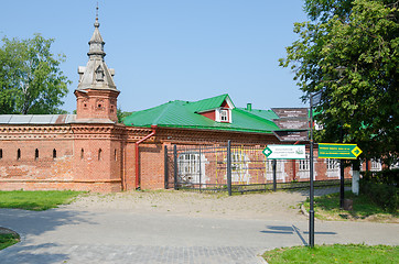 Image showing Sergiev Posad - August 10, 2015: the intersection with the pointer in the red wall extending from retail shops around Pafnutevskom garden at the Trinity-Sergius Lavra