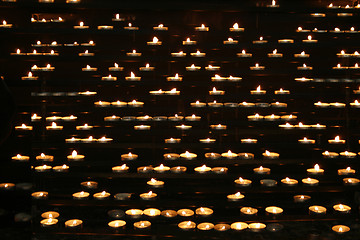 Image showing candles in the dark night