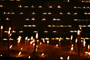 Image showing candles in the dark night