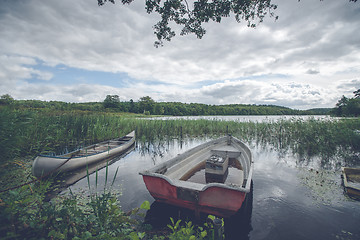 Image showing Idyllic lake with a small boat 