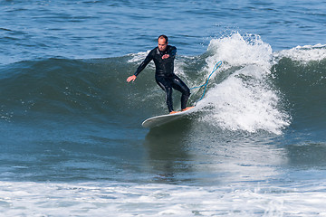 Image showing Surfing the waves