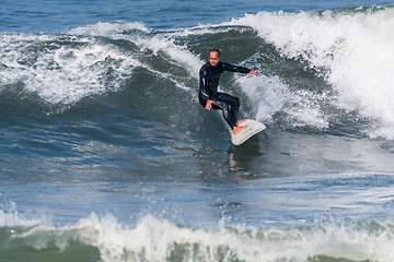 Image showing Surfing the waves