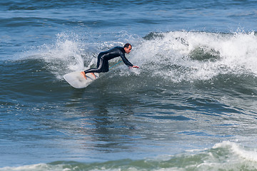 Image showing Surfing the waves