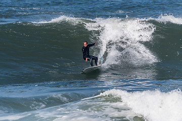 Image showing Surfing the waves