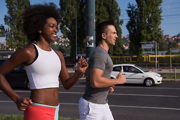 Image showing multiethnic group of people on the jogging