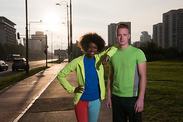 Image showing Portrait of romantic pretty couple on fitness session, outside t