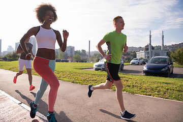 Image showing multiethnic group of people on the jogging