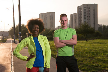 Image showing Portrait of romantic pretty couple on fitness session, outside t