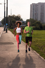 Image showing multiethnic group of people on the jogging