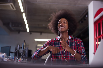 Image showing portrait of a young successful African-American woman in modern 