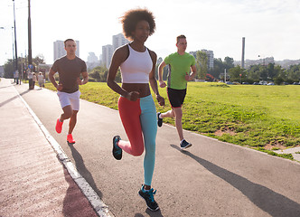 Image showing multiethnic group of people on the jogging