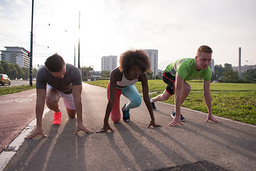 Image showing multiethnic group of people on the jogging