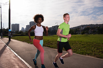 Image showing multiethnic group of people on the jogging