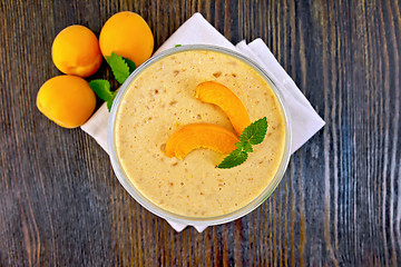 Image showing Jelly air apricot in glass bowl on board top