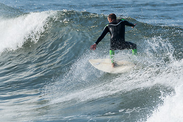 Image showing Surfing the waves