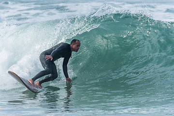 Image showing Surfing the waves