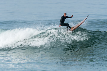 Image showing Surfing the waves