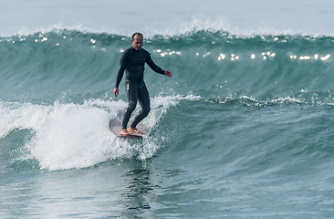 Image showing Surfing the waves