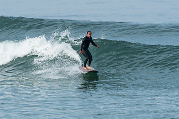 Image showing Surfing the waves