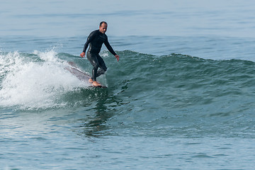 Image showing Surfing the waves