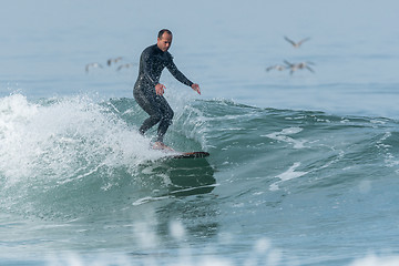 Image showing Surfing the waves