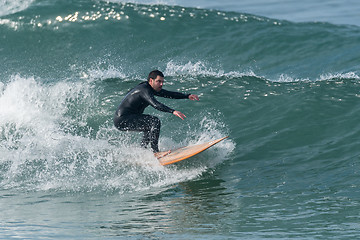 Image showing Surfing the waves