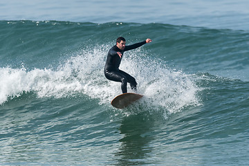 Image showing Surfing the waves