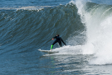 Image showing Surfing the waves