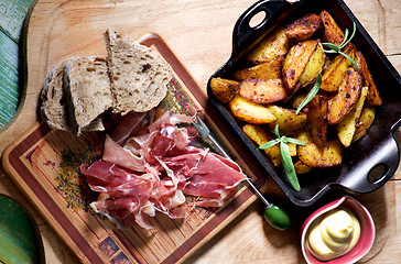 Image showing Potato Wedges and Jamon