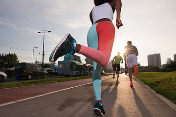 Image showing multiethnic group of people on the jogging