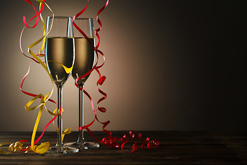 Image showing Two glasses of champagne ready to party