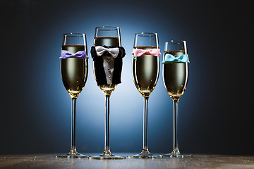 Image showing Four elegant stylish champagne glasses. Bachelor party concept